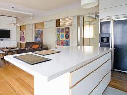 A raised secondary kitchen island in a striking glossy jet black finish is set in front of the main island, instantly drawing the eyes to the center of the kitchen. Kitchen Island Design Ideas Pictures Options Tips Hgtv