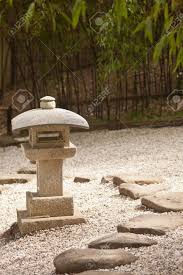 Old Japanese Stone Lantern In A Garden Japanese Stone Lanterns Japanese Garden Lanterns Japanese Lanterns