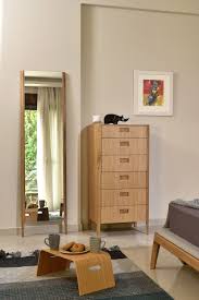 Purchase several for use in furnishing a home or setting up multiple hotel rooms for future guests. Chest Of Drawers All Wood Tall Dresser Ozzy Tall Dresser Bedroom Set Modern Wood Furniture Home