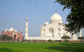 The arabic calligraphy from the holy quran and motifs of entwined flowers, leaves and vines spiraling down its niches. Taj Mahal Definition Story Site History Facts Britannica
