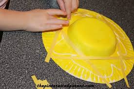 Put the plate hats on the kid's heads so that they cannot see their own number. Paper Plate Straw Scarecrow Hat The Pinterested Parent