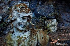 Odd sculptures guard the ice house of Villa Pisani photo & image