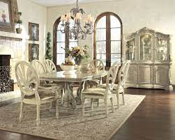 The chandelier or pendant above your dining table isn't always the only light fixture in the room — designers actually advise against having a single light source — but it probably will be the most visible and make the biggest impact. Ortanique Light Opulent Color Dining Room Set Formal Dining Room Sets Dining Table Dining Room Sets