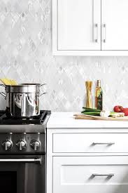 Elegant White Rhomboid Backsplash Tile Backsplash Com In 2020 White Tile Backsplash White Quartz Countertop White Backsplash