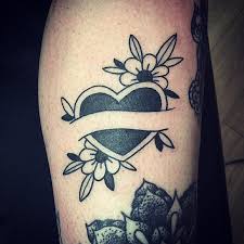 Are there tattoos that say home is where the heart is? A Love That S Black And White Black Heart Tattoos White Heart Tattoos Tattoos