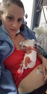 'Iron Man' premature baby born weighing just 685g is in hospital 200 miles  from family