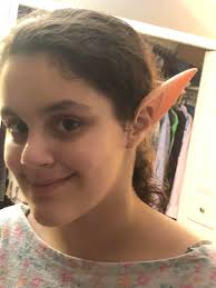 My daughter had to try my ears… i cosplay as an EQ elf and as my ranger  from D&D, thus the two different sizes
