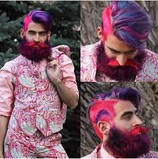 As a man with long hair, you might consider getting a color combination between green, pink and purple highlights and you don't necessarily need to use permanent hair dye. Guys Colourful Hair
