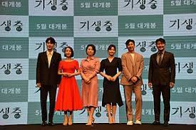 Parasite definition, an organism that lives on or in an organism of another species, known as the host, from the body of which it obtains nutriment. Parasite Film Wikipedia