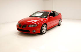 Image result for Medium Red 2004 Pontiac