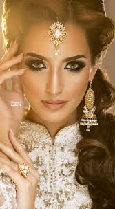 Minus The Green Contacts Love Her Makeup Hair White Outfit And Jewelry Bridal Eye Makeup Eye Makeup Indian Bridal Makeup