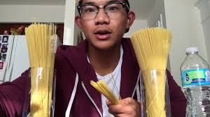 Most Uncooked Spaghetti Noodles Held In One Hand At Once