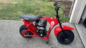 What engine can be used to replace the engine on a Coleman mini bike?