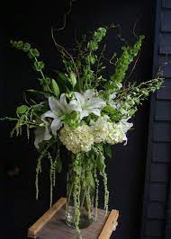 The one who takes away our sins, binds up the broken hearted, gives hope to the hopeless, heals the sick and delivers the captive. Pin By The Flower Stand On Sympathy And Celebration Of Life Ideas Floral Arrangements Celebration Of Life Floral