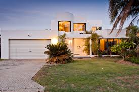 Traditional stucco is simply a variety of concrete, applied in several layers to create a strong bond to the wall. White Stucco House Houzz