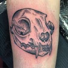 Skull tattoos are often misunderstood tattoo designs, especially in a particularly conservative community. 15 Curious Cat Skull Tattoos Tattoodo