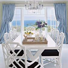 Sparkling White Floors Billowing Window Treatments And Bamboo Chippendale Dining Chairs Create The Right Blend Of Home Modern Dining Room Chippendale Chairs