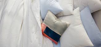 The duvet is inserted into the cover, thus explaining the term 'duvet insert'. How To Put On A Duvet Cover