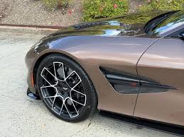Image result for Bronze Flare 2025 Aston Martin