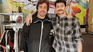 There is the word 'blessed' behind his ear. Fernando Alonso Estrena Tatuaje En La Muneca Muy Interesante Tatuantes