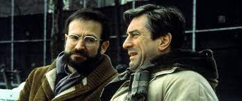 Sayer and the security guards attempt to restrain leonard, robin featured in siskel & ebert & the movies: Awakenings Movie Review Film Summary 1990 Roger Ebert