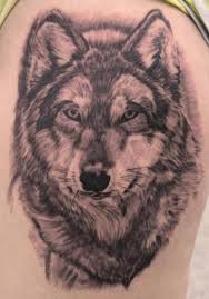 A woman with a fair to brown complexion can have this dream catcher tattoo inscribed. Grey Wolf Dreamcatcher Tattoo On Biceps
