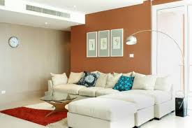 Graham & brown folklore burnt orange wallpaper 20 587 the home depot. Living Room With Tan And Burnt Orange Accent Walls Accent Wall 850x567 Wallpaper Teahub Io