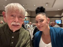Don Lutes (age 88-1/2) with his granddaughter Rebecca at the Machine Shop  Retirement Party tonight.