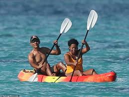 President barack obama credits his wife first lady michelle obama for being smarter than he is when it comes to the idea of politics. Barack And Michelle Warm Up For The Holidays In Hawaii With Couple S Kayak Outing Daily Mail Online