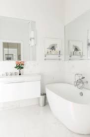 Tiny But Mighty Bathrooms Homepolish In 2020 White Bathroom Designs White Marble Bathrooms White Bathroom Tiles