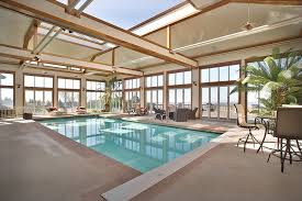 Step Inside An Oregon Home With Amazing Views And A Bowling Alley Indoor Pool Design Indoor Outdoor Pool Dream Pool Indoor