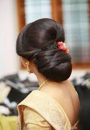 What A Beautiful Large Low Bun Care However Should Be Taken Before Adopting Such Hairstyles As Due To It S Hig Bun Hairstyles Side Bun Hairstyles Hair Styles