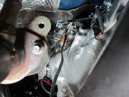 The darker plug outlet on the side of the light shell. Toyota Camry Kat S Heaters Custom Fit Engine Block Heater Cartridge Style 120v 400 Watts