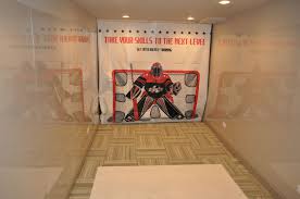 Basement Home Gym With Hockey Shooting Area Basement Gym Basement Home Gym Design