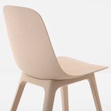 The chair comes in white, blue and brown and the finish contains wood flakes that are visible to the eye. Odger Chair White Beige Ikea