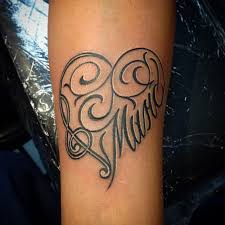 Name tattoo designs can be inked in different parts of the body like the wrists, the arm or even incorporated in larger tattoo designs. Amazing Grace Cross Tattoo Shefalitayal