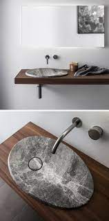 the design of this natural stone sink is inspired by the shape of craters left from a volcano modern bathroom sink unique bathroom sinks modern sink