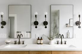 Ideally, the mirror should be mounted a few inches higher than the tallest point of your vanity faucet, or between 5 to 10 inches above the bathroom sink. 10 Feng Shui Rules For Decorating With Mirrors