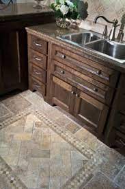 Darker tones hide the dirt from foot traffic and cooking spills better than light colors such as white. This One Too Kitchen Floor Tile Trendy Kitchen Tile Kitchen Floor Tile Patterns