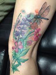 Wild Flowers With Dragonfly Tattoo Dragonfly Tattoo Tattoos Dragonfly Tattoo Design
