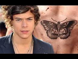 Harry styles one direction updated tattoos sweatshirt. One Direction Harry Styles Gets A Butterfly Tattoo Commentary Youtube