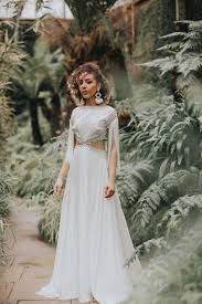 Bohemian chic wedding bouquets are full of whimsical details, wild flowers and feathers. Where To Buy Boho Wedding Dresses One Fab Day