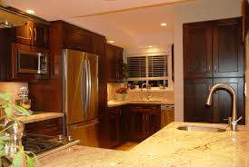 Our test kitchen is lined with cabinets, top and bottom and in the center too. Deep Cove Kitchen Cabinets Kitchen Counter Top And Renovation Complete Kitchen Renovations Complete Kitchens Kitchen Cabinets