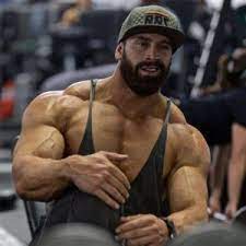 Bradley Martyn Is An American Bodybuilder Fitness Coach And Social Media Star Who Stands 6 Feet 3 Inches Tal Bradley Martyn Body Building Men Bodybuilders Men