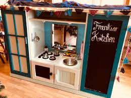tv cabinet into a play kitchen