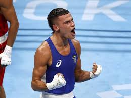 A tradie who isn't afraid to get in touch with his feminine side will bring home australia's first olympic boxing medal in more than three decades. Boxer Harry Garside Assured Of Tokyo Medal The Canberra Times Canberra Act