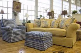 Amazing gallery of interior design and decorating ideas of yellow tufted ottoman in bedrooms, closets, living rooms, girl's rooms by elite interior designers. Interim Furnishings Yellow Looseback Sofa With Blue Plaid Chair And Ottoman Blue And Yellow Living Room Blue Living Room Decor Yellow Decor Living Room
