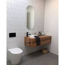 Mirrella ribbon tile is designed to look like real hardwood with the ease of owning porcelain flooring. 1 X 6 Porcelain Mosaic Sheet Tile In 2021 White Bathroom Tiles Laundry In Bathroom Bathroom Wall Tile