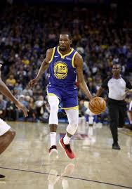 Kevin Durant Of The Golden State Warriors Dribbles The Ball Down Golden State Warriors Golden State Warriors Pictures Warrior