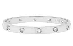 It Looks Great But Is It Real How To Spot A Fake Cartier Love Bracelet Love Bracelets Cartier Love Bangle Cartier Love Bracelet